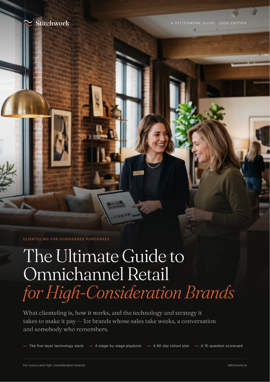 The cover of The Ultimate Guide to Omnichannel Retail for High-Consideration Brands: an associate showing a client a tablet in a furniture showroom